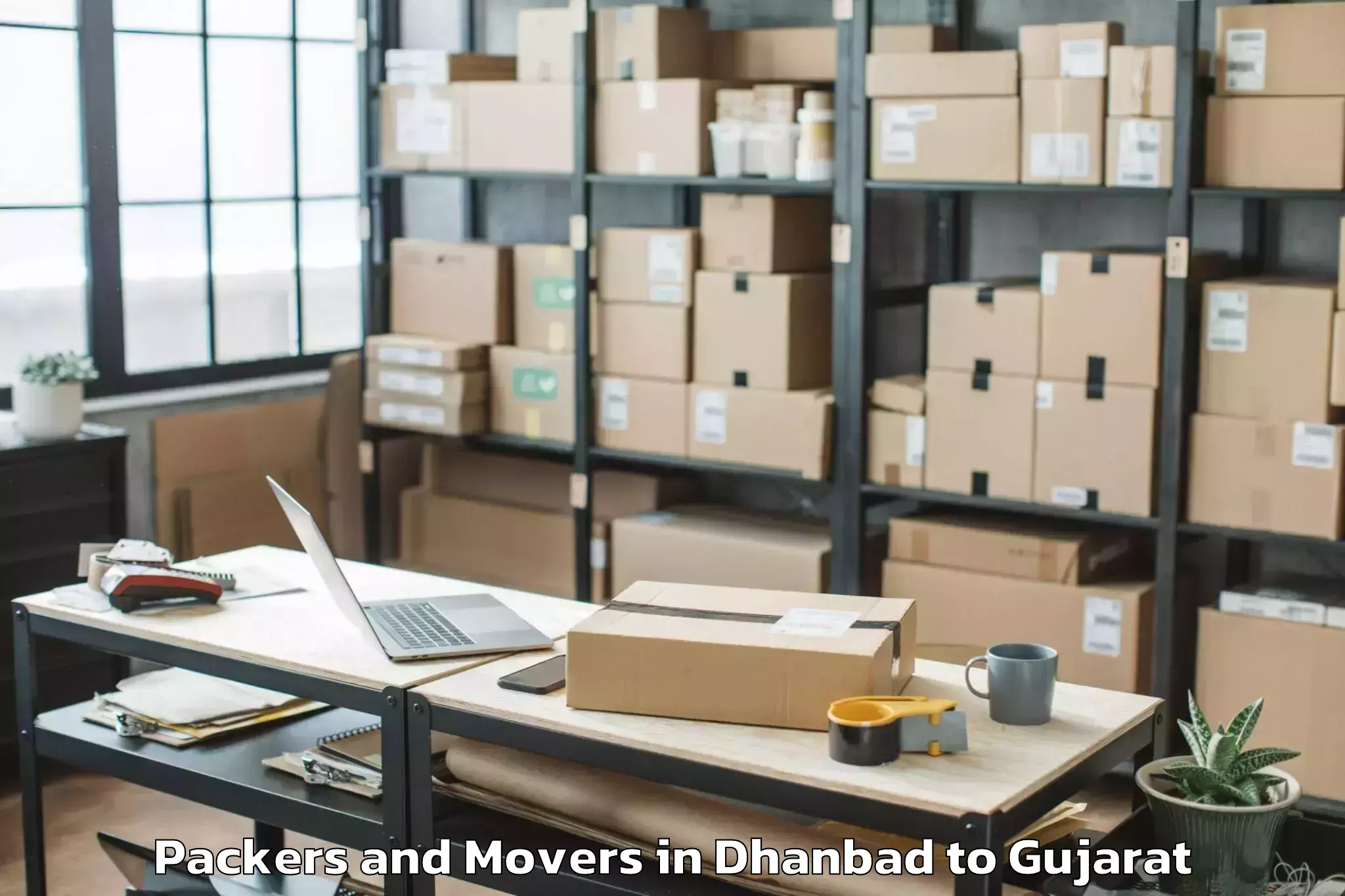 Affordable Dhanbad to Jhalod Packers And Movers